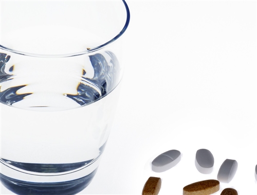 stockvault-pills-and-water135564.jpg